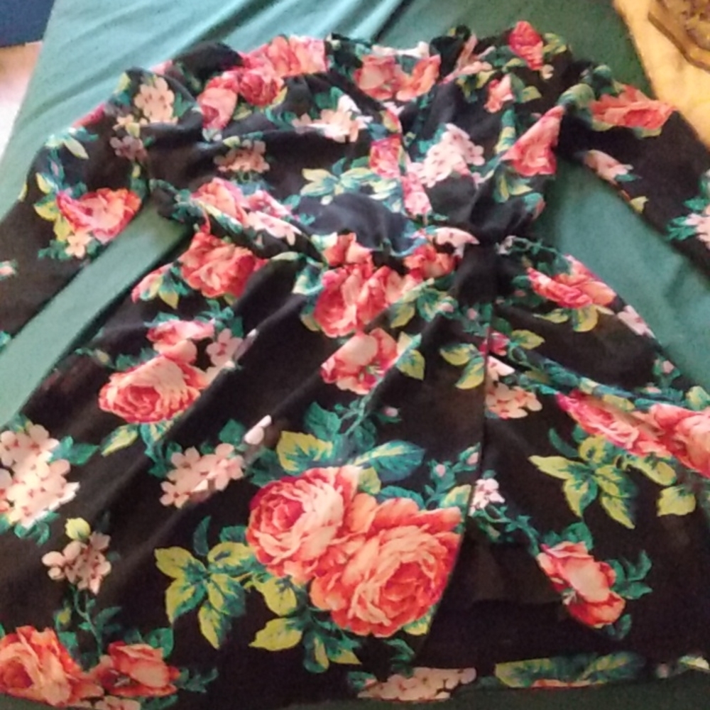 Small silky black formal dress with red and pink flowers with green stems long